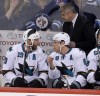 Trevor Hagan / The Canadian Press
San Jose Sharks' Joe Thornton (19), Joe Pavelski (8) speak on the bench as head coach Todd McLellan looks on during third period against the Winnipeg Jets in Winnipeg Tuesday.