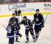 TREVOR HAGAN / THE CANADIAN PRESS
Winnipeg Jets' Jack Roslovic (28), Bryan Little (18), Mathieu Perreault (85) and Tyler Myers (57) celebrate after Little scored late against the Dallas Stars during third period NHL hockey action in Winnipeg, Sunday, January 6, 2019.