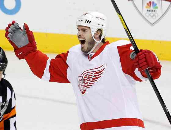 THE CANADIAN PRESS/AP Mark HumphreyFormer Detroit Red Wing Ian White celebrates after scoring against the Nashville Predators in the first period of Game 2 of an NHL hockey Stanley Cup first-round playoff series, Friday, April 13, 2012, in Nashville, Tenn. Police seized a small arsenal of firearms at the Winnipeg home and Kenora cottage of former NHL player.