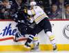 John Woods / WINNIPEG FREE PRESS archives
Jets' Toby Enstrom is day-to-day after this smash from Sabres' Steve Ott Tuesday.