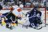 JOHN WOODS / WINNIPEG FREE PRESS
Calgary’s Dennis Wideman gets the Flames on the board in the second, blasting a puck past Winnipeg Jets goaltender Ondrej Pavelec as Mark Scheifele (55) tries in vain to block the shot.