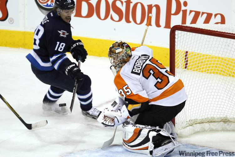 JOHN WOODS / WINNIPEG FREE PRESS
Winnipeg Jets' forward Bryan Little's shot is saved by Philadelphia Flyers' goalie Sergei Bobrovsky Saturday at the MTS Centre.