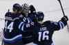 JOHN WOODS / WINNIPEG FREE PRESS
Winnipeg Jets' Zach Bogosian (44), goaltender Ondrej Pavelec (31) and Andrew Ladd (16) celebrate their NHL win over the over San Jose Sharks in Winnipeg on Sunday, November 10, 2013.
