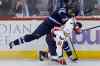 JOHN WOODS / WINNIPEG FREE PRESS
Winnipeg's Adam Pardy (2) tangles with Washington's Steve Oleksy (61) in the first period Tuesday evening.