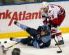 J Pat Carter / The Associated Press
Florida Panthers' Stephen Weiss (9) and Carolina Hurricanes' Tim Gleason (6) battle for the puck during the first period of an NHL hockey game in Sunrise, Fla., Sunday, March 11, 2012.