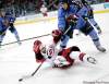 David Goldman/ The Associated Press
Carolina Hurricanes Chad LaRose  falls down in front of Atlanta Thrashers Zach Bogosian during the third period of a game  Feb. 13, 2011 in Atlanta.