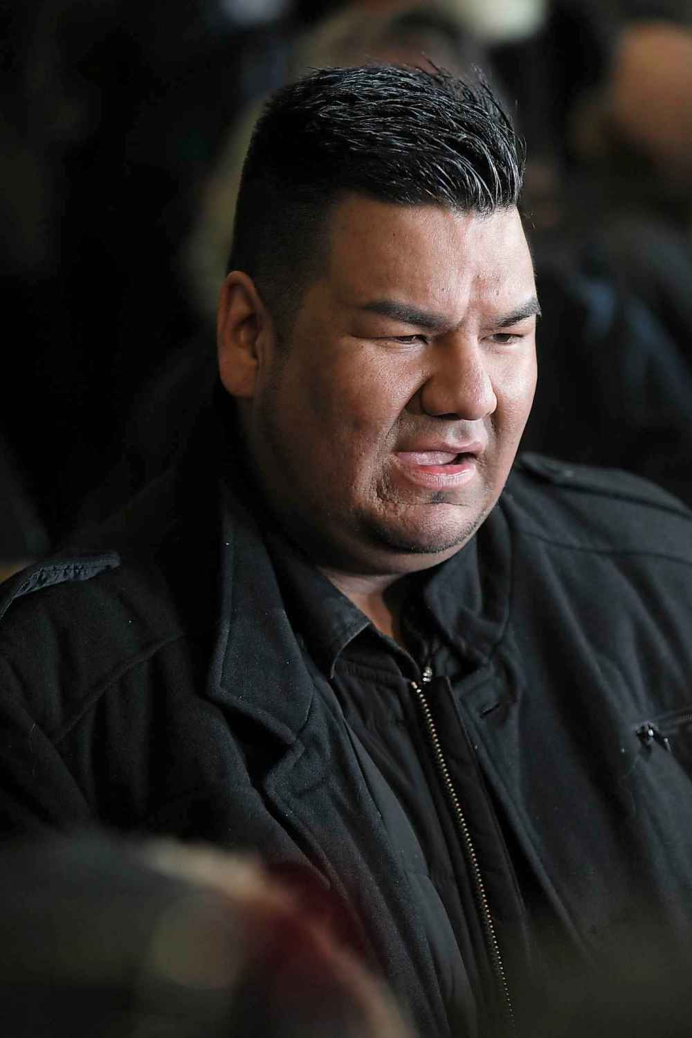 RUTH BONNEVILLE / WINNIPEG FREE PRESS
York Factory First Nation Chief Leroy Constant stands among protesters after speaking at a rally held at the legislature Friday. He says he isn’t surprised police aren’t acting quickly.
