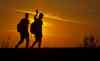 CP
Refugees from the Middle East are silhouetted against the setting sun as they walk on railway tracks from Serbia, in Roszke, Hungary, Sunday, Aug. 30, 2015. Migrants fearful of death at sea in overcrowded and flimsy boats have increasingly turned to using a land route to Europe through the Western Balkans. (AP Photo/Darko Bandic)
