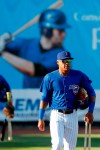Iowa Cubs shortstop Addison Russell walks on the field before a Triple-A baseball game against the Nashville Sounds, Wednesday, April 24, 2019, in Des Moines, Iowa. Russell played in his first game of the season Wednesday for Iowa as he prepares to return to the Chicago Cubs following his domestic violence suspension. (AP Photo/Charlie Neibergall)