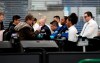 Transportation Security Administration officers work at a checkpoint at O'Hare airport in Chicago, Friday, Jan. 11, 2019, as the partial government shutdown continues. (AP Photo/Nam Y. Huh)