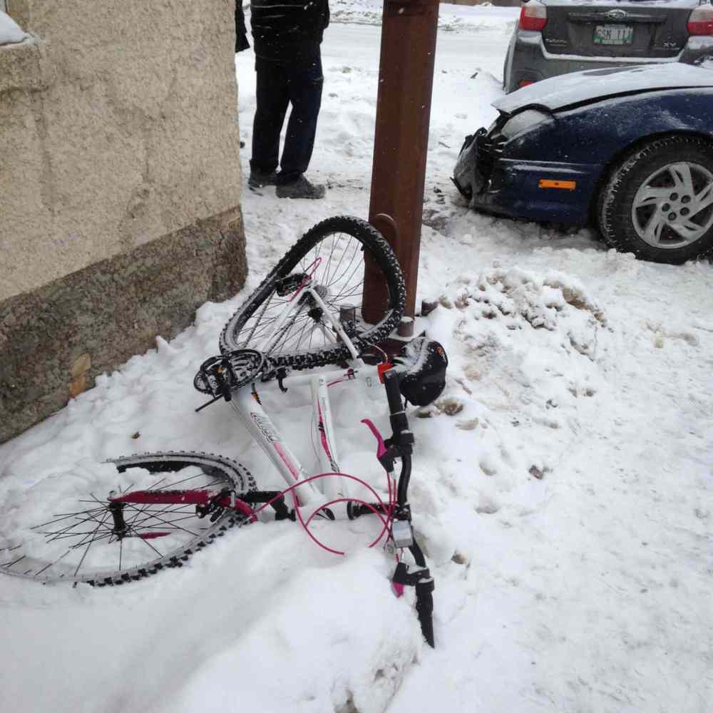Cyclist in hospital after being struck by vehicle – Winnipeg Free Press