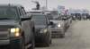 Wayne Glowacki / Winnipeg Free Press
Cars are lined up at Richardson International Airport Friday, where demonstrators are slowing traffic as part of Idle No More events being held across Canada.