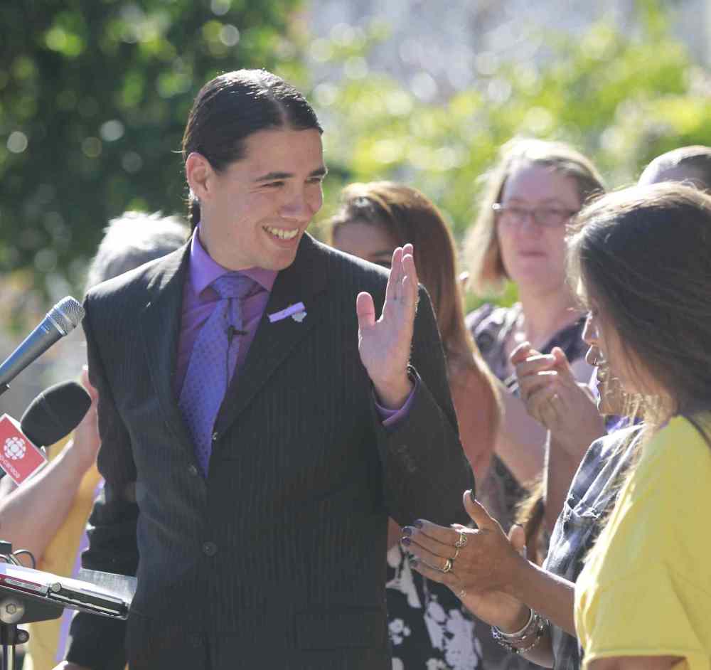 Wayne Glowacki / Winnipeg Free Press
Mayoral candidate Robert-Falcon Ouellette with supporters addresses homelessness and discrimination in Winnipeg Monday in front of City Hall.