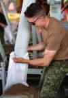 Trevor Hagan / Winnipeg Free Press
Soldiers from CFB Shilo, who along with members of the Portage la Prairie Municipality, were filling sandbags at the Portage Yard, Saturday, July 5.