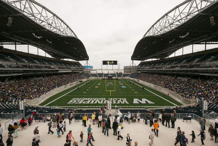 Melissa Tait / Winnipeg Free Press
Investors Group Field welcomes thousands Sunday afternoon, as attendees flow in for the One Heart celebration, the first event held at the new stadium.