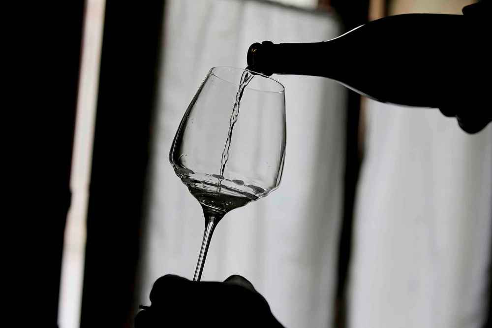 CP
In this image taken on Monday, Oct. 15, 2018, wine grower Adelino Pizzobon spills a bottle of Prosecco during a wine tasting at the Case Paolin farm, in Volpago del Montello, Italy. Prosecco has become the best-selling sparkling wine in the world, and experts say it is eroding the more casual corner of champagne's market while aiming higher. Its production eclipsed champagne's five years ago and is now 75 percent higher at 544,000 bottles three-quarters of which for export. (AP Photo/Luca Bruno)