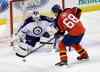 Alan Diaz / The Associated Press
Winnipeg Jets goalie Michael Hutchinson (34) prepares to block a shot by Florida Panthers right wing Jaromir Jagr (68) during the first period of an NHL hockey game, Saturday.