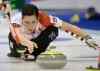 Ryosuke Uematsu / Kyodo News / The Associated Press
Canadian second Jill Officer releases a rock during a round-robin win over Japan Thursday.