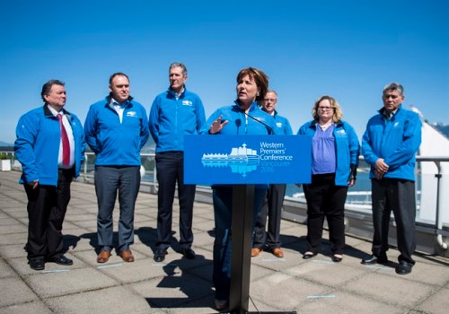 Premiers from Canada's western provinces speak with media during the Western Premiers' Conference in Vancouver, B.C. on Friday, May 6, 2016. Left to right are Nunavut Premier Peter Taptuna, Yukon Premier Darrell Pasloski, Manitoba Premier Brian Pallister, British Columbia Premier Christy Clark, Saskatchewan Premier Brad Wall, Alberta Deputy Premier Sarah Hoffman, and Northwest Territories Deputy Premier Robert C. McLeod. THE CANADIAN PRESS/Jimmy Jeong