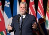 Quebec Premier Philippe Couillard speaks to reporters before a meeting with premiers hosted by the Council of The Federation in Ottawa on Monday, Nov. 23, 2015. THE CANADIAN PRESS/Justin Tang