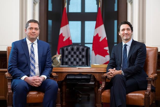 Prime Minister Justin Trudeau meets with Conservative leader Andrew Scheer in his office on Parliament Hill in Ottawa on Tuesday, Nov. 12, 2019. Trudeau will lay out priorities for his new minority government on Dec. 5. THE CANADIAN PRESS/Justin Tang