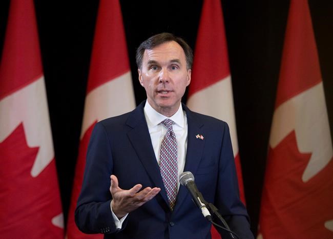 Minister of Finance Bill Morneau speaks during a press conference at the media lock-up, before tabling the budget in the House of Commons on Parliament Hill, in Ottawa on Wednesday, March 22, 2017. THE CANADIAN PRESS/Justin Tang