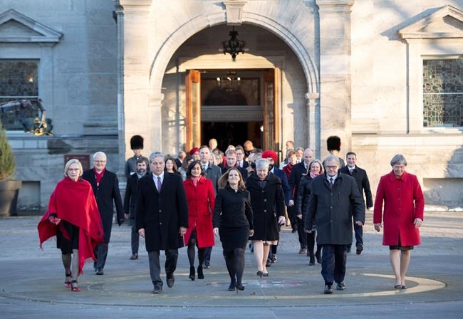 Members of the federal cabinet walk through the forecourt at Rideau Hall after a swearing in ceremony in Ottawa, on Wednesday, Nov. 20, 2019. THE CANADIAN PRESS/Justin Tang