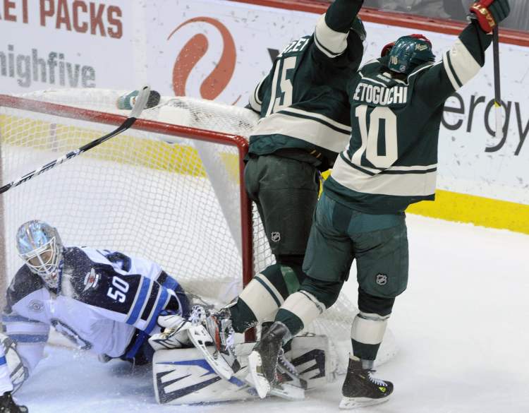 Jim Mone / The Associated Press
Winnipeg Jets goalie Chris Mason gives up a goal to Minnesota Wild's Devin Setoguchi (10) in the first period of their NHL game Thursday, in St. Paul, Minn.