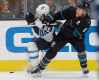 (AP Photo/Jeff Chiu)
San Jose Sharks centre Joe Pavelski reaches over the shoulder of Winnipeg Jets' Mathieu Perreault in San Jose, Thursday. The Jets would go on to win the game 5-3 despite being outshot and badly out-played for long stretches of the game.