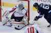 JOHN WOODS / WINNIPEG FREE PRESS
Washington Capitals goaltender Braden Holtby makes a save on a close-in scoring attempt by Winnipeg Jets forward Michael Frolik during first-period NHL action at the MTS Centre in Winnipeg Tuesday.