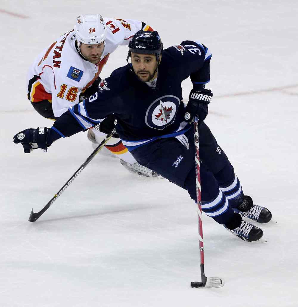 Trevor Hagan / The Canadian Press
The Jets tried Dustin Byfuglien at forward on the power play against the Flyers.