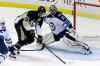 GENE J. PUSKAR / THE ASSOCIATED PRESS
Pittsburgh Penguins' Evgeni Malkin can't get to a rebound in front of Winnipeg Jets goalie Al Montoya during the first period.