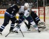 JOE BRYKSA/ WINNIPEG FREE PRESS
Winnipeg Jets' Jacob Trouba ties it up with Vancouver Canucks' Daniel Sedin during the first period of Friday's game in Winnipeg.