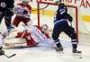 Phil Hossack / Winnipeg Free Press
Winnipeg Jets forward Evander Kane loses the puck in his skates as Washington Capitals goaltender Braden Holtby sprawls out to cover the net during the first-period.
