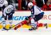 Chris Seward / Raleigh News & Observer/ Tribune Media MCT
Carolina Hurricanes' Jordan Staal (11) dives for the puck against Winnipeg Jets' Jacob Trouba (8) and Andrew Ladd (16) during first period at the PNC Arena in Raleigh, N.C., on Tuesday.