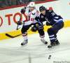 Phil Hossack / Winnipeg Free Press
The Winnipeg Jets' Mark Flood (33) and Washington Capitals'  Marcus Johansson fight for possession in the Jets' end of the rink Thursday at the MTS Centre.