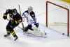 Gary Wiepert / The Associated Press
Sabres winger Matt Moulson tips the puck past Jets goalie Ondrej Pavelec, Tuesday in Buffalo.