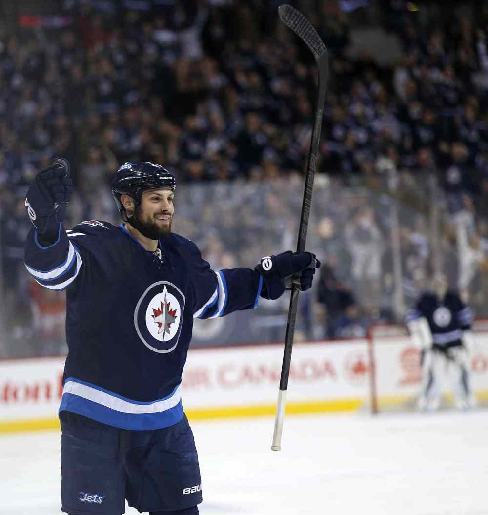 TREVOR HAGAN/WINNIPEG FREE PRESS
Winnipeg Jets' Zach Bogosian (44) celebrates after he scored against the Toronto Maple Leafs during the second period of Saturday's NHL hockey game at Winnipeg's MTS Centre.