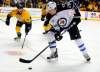 Mike Strasinger / The Associated Press
Winnipeg Jets' right winger Blake Wheeler controls the puck as Nashville Predators' defenceman Ryan Ellis closes in on him Saturday in Nashville.