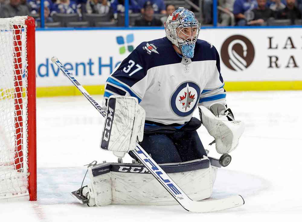 (AP Photo/Chris O'Meara)
Winnipeg Jets goaltender Connor Hellebuyck makes a save during the second period of the game Tuesday.