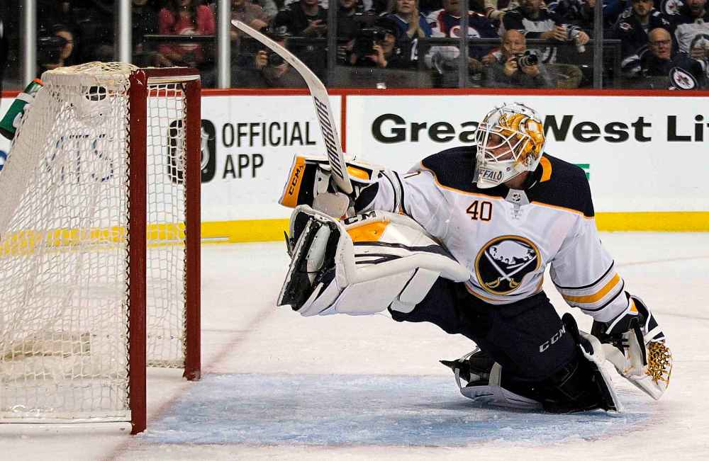 PHIL HOSSACK / WINNIPEG FREE PRESS
Buffalo Sabres netminder Carter Hutton watches a shot from Winnipeg Jets' Kyle Connor stretch the mesh on the first goal of the game at the Bell MTS Place Friday.