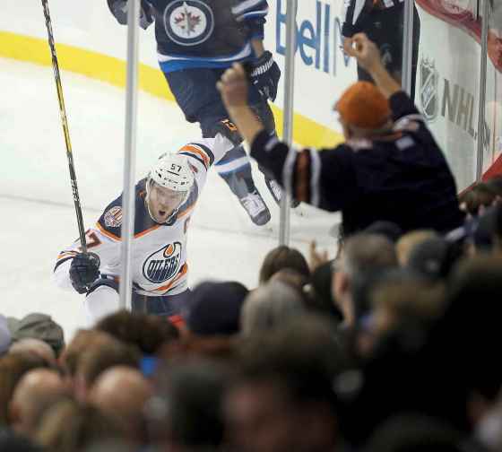 THE CANADIAN PRESS/Trevor HaganEdmonton Oilers' Connor McDavid celebrates after scoring against the Winnipeg Jets during first period NHL hockey action in Winnipeg, Tuesday, October 16, 2018.