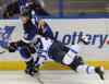 photos by Bill Boyce / The associated Press
Jets defenceman Toby Enstrom falls headfirst into the Blues' T.J. Oshie during their game in St. Louis last night.