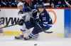 THE CANADIAN PRESS/John Woods
Winnipeg Jets' Par Lindholm steals the puck from St. Louis Blues' Tyler Bozak during the second period in Winnipeg on Wednesday.