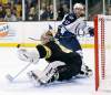 Michael Dwyer/ The Associated Press
Winnipeg Jets' Kyle Wellwood watches as his shot deflects off the glove of Boston Bruins' Tuukka Rask during the first period of a game in Boston today.