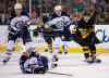 Winslow Townson / The Associated Press
Winnipeg Jets defenseman Toby Enstrom (39) and Boston Bruins' Riley Nash (20 eye a loose puck during the second period of an NHL hockey game in Boston Saturday.