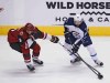 CP
Arizona Coyotes left wing Viktor Tikhonov, left, and Winnipeg Jets center Mathieu Perreault battle for the puck in the first period during an NHL hockey game, Thiursday, Dec. 31, 2015, in Glendale, Ariz. (AP Photo/Rick Scuteri)