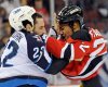 CP
New Jersey Devils' Mark Fraser, right, fights with Winnipeg Jets' Chris Thorburn during the first period of an NHL hockey game, Saturday, Nov. 5, 2011, in Newark, N.J. (AP Photo/Bill Kostroun)