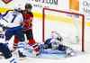 Rich Schultz / The Associated Press
Winnipeg Jets goalie Michael Hutchinson (34) dives to cover up the puck as defensemen Ben Chiarot (7) pushes off New Jersey Devils center Kyle Palmieri (21).