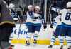 (AP Photo/John Locher)
Winnipeg Jets defenseman Dmitry Kulikov celebrates after left wing Nikolaj Ehlers scored against the Vegas Golden Knights during the first period Friday in Las Vegas.